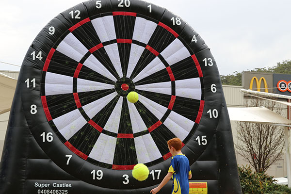 Have a kick at the inflatable dart board in Dane Drive 