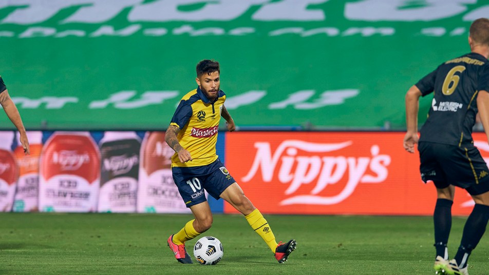 Daniel DeSilva looks to push forward against Wanderers