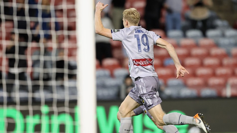 Matt Simon celebrates against the Jets in Newcastle