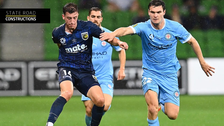 Daniel Bouman duels with Melbourne City's Curtis Good