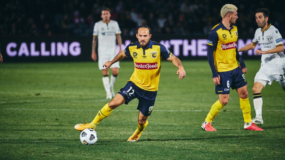 Marco Urena pushes forward against Macarthur