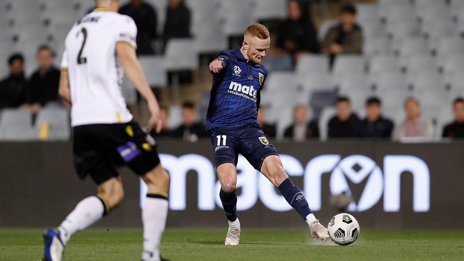 Jack Clisby strikes at goal against Macarthur in Campbelltown
