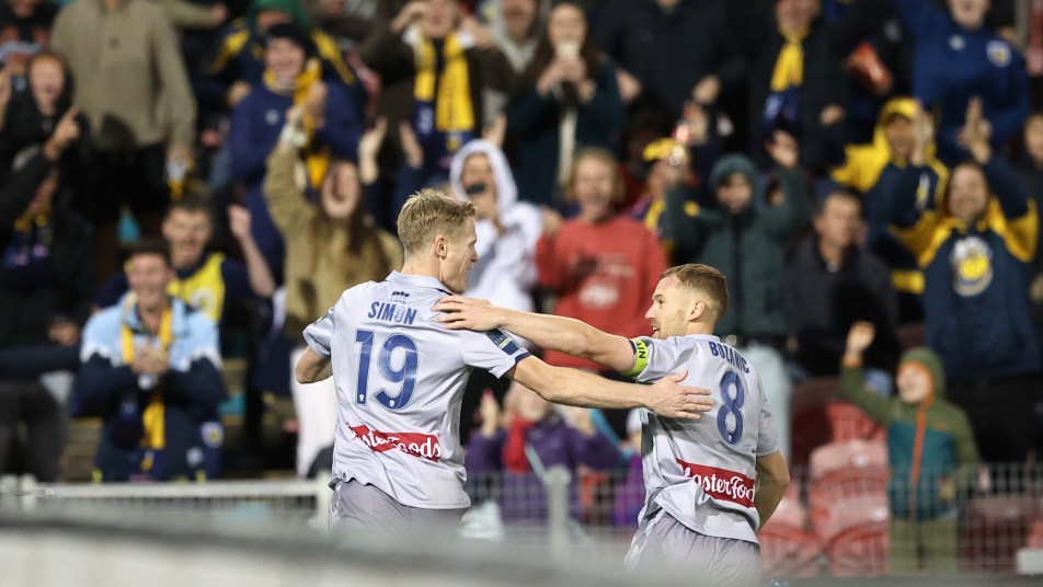 Ollie and Simmo celebrate