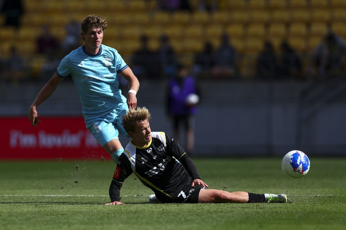 Bryce Duke of the Phoenix tackles Lucas Mauragis of the Mariners at Hnry Stadium.